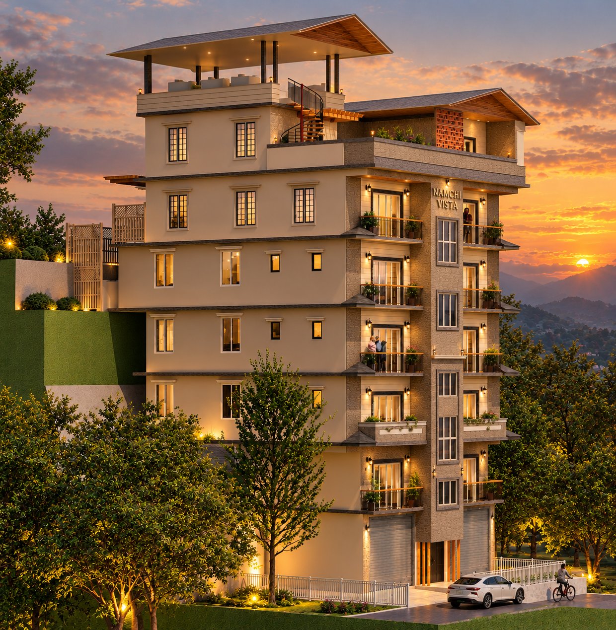 Namchi Vista Apartments illuminated against a sunset sky